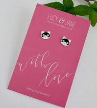 Load image into Gallery viewer, sterling silver black and white cat earrings on a With Love card