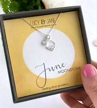 Load image into Gallery viewer, sterling silver june birthstone necklace with calm seas charm