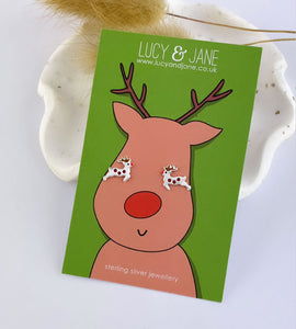 fun sterling silver leaping reindeer earrings for children on a christmas backing card