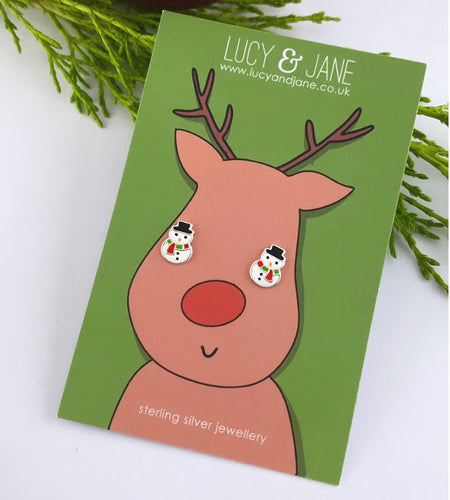 sterling silver snowman stud earrings on a  fun Christmas backing card.  Snowmen earrings are white with a green and red scarf and a black hat