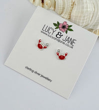Load image into Gallery viewer, Beach inspired sterling silver crab stud earrings in red.  Displayed on a Lucy and Jane earring card