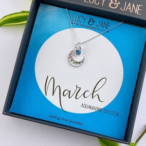 sterling silver rainbow crescent moon birthstone necklace for march with an aquamarine crystal