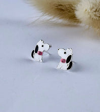 Load image into Gallery viewer, Dog-shaped earrings with pink stones on a light gray background