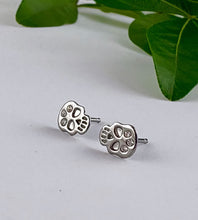 Load image into Gallery viewer, sterling silver small flat skull studs featuring three small crystals on each skull