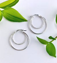 Load image into Gallery viewer, sterling silver double hoop earrings - larger hoop polished and smaller inner hoop hammered finish