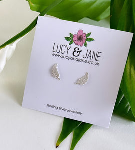 small sterling silver feather studs suitable earrings for children or adults