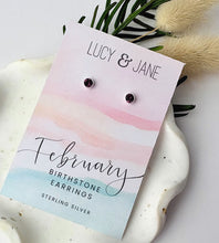 Load image into Gallery viewer, Sterling silver february birthstone studs with purple purple Swarovski crystals, representing the amethyst February birthstone