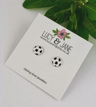 Load image into Gallery viewer, sterling silver football earrings on a Lucy and Jane earring card