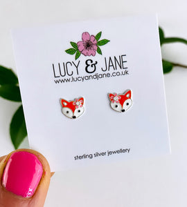 sterling silver fox studs for children in orange with a cute pink flower