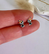 Load image into Gallery viewer, Fun sterling silver black cat ear studs.  Cats are wearing stripy black and orange witch hats for Halloween.