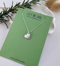 Load image into Gallery viewer, sterling silver hammered heart necklace on a Lucy and jane backing card