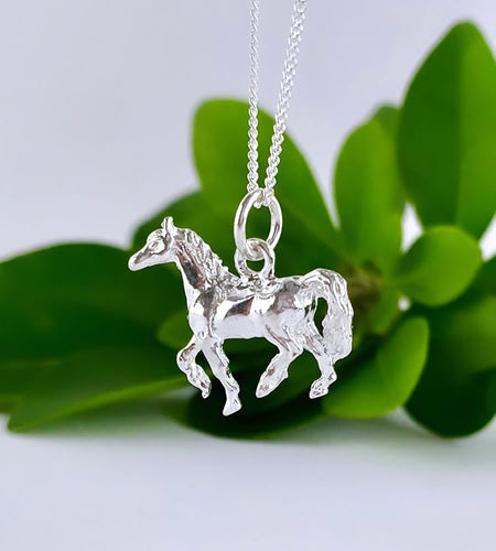 sterling silver horse necklace on an 18