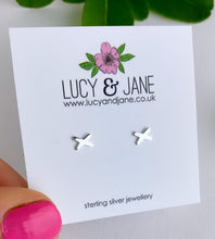 Load image into Gallery viewer, sterling silver tiny studs in the shape of a cross or kiss