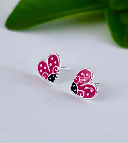 adorable new sterling silver ladybird stud earrings in the shape of a heart.