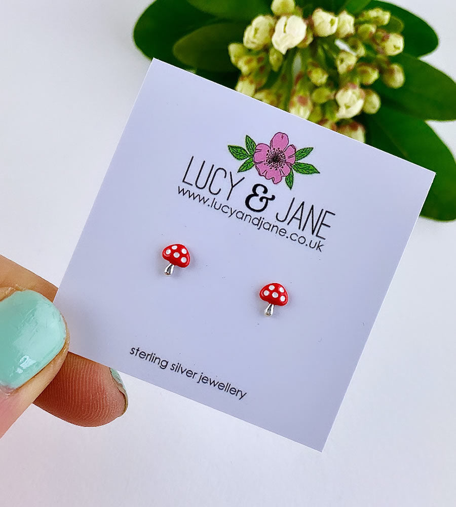 tiny sterling silver mushroom studs in red with white spots