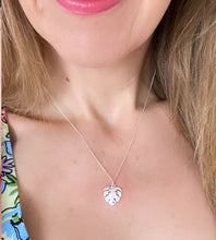 Load image into Gallery viewer, sterling silver monstera leaf necklace on model