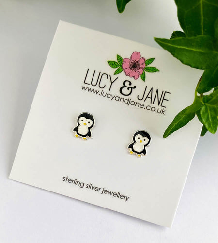 Sterling sivler Penguin earrings on a Lucy & Jane branded card