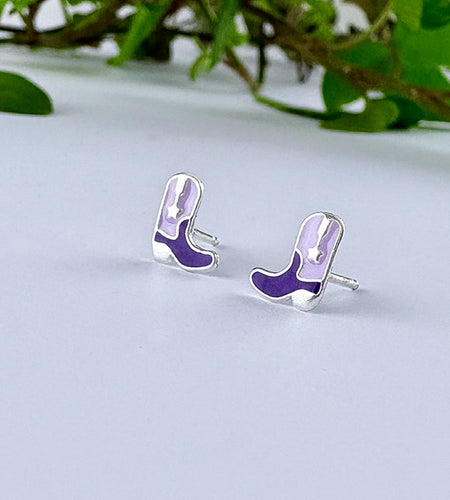 Purple cowboy boot earrings.  The Pink Pony Club earrings have had  purple glow up
