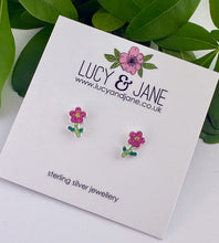 Load image into Gallery viewer, sparkly sterling silver pink and green flower studs for children. Displayed on a Lucy and Jane earring card