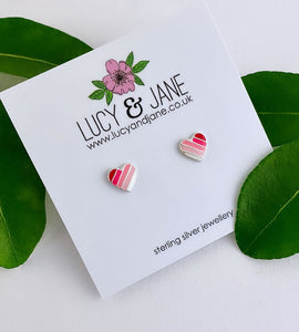 sterling silver pink stripe heart studs on a white backing card