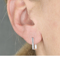 Load image into Gallery viewer, sterling silver rectangle hoops in model&#39;s ear