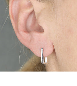 sterling silver rectangle hoops in model's ear