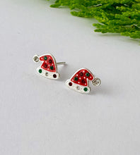 Load image into Gallery viewer, A pair of silver stud earrings shaped like Santa hats, decorated with red and green crystals. Christmas earrings for children and fun loving adults