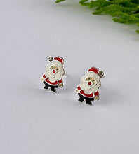 Load image into Gallery viewer, A pair of sterling silver Santa stud earrings - featuring red and white clothing with black pants. Great kids earrings for Christmas