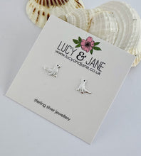Load image into Gallery viewer, sterling silver seal studs on a Lucy and Jane earring card