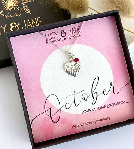sterling silver textured heart birthstone necklace for October birthdays with a pretty sparkly pink tourmaline stone.