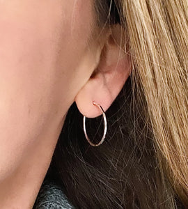 medium sterling silver sleeper hoop in model's ear