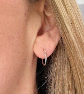 sterling silver small sleeper hoops in models ear