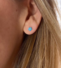 Load image into Gallery viewer, small sterling silver blue daisy studs in model&#39;s ear