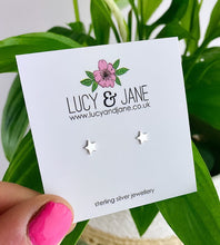 Load image into Gallery viewer, sterling silver small star studs on a Lucy and Jane jewellery backing card