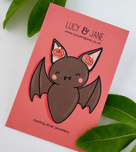 Load image into Gallery viewer, sterling silver sparkly pumpkin studs on a Lucy and Jane limited edition Halloween earring card