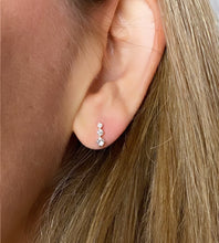 Load image into Gallery viewer, mini sterling slver sparkly studs on model