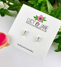 Load image into Gallery viewer, sterling silver small sparkle studs on a Lucy and Jane card