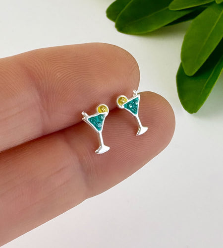sterling silver blue sparkly cocktail studs with a tiny sparkly lemon slice on the side of the glass.
