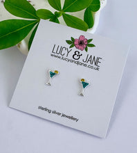 Load image into Gallery viewer, Fabulous sterling silver sparkly blue cocktail stud earrings on a Lucy and Jane backing card