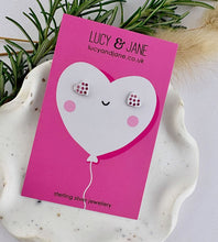 Load image into Gallery viewer, classic sterling silver heart studs scattered with pink and red crystals. Displayed on a heart shaped valentine card