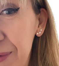 Load image into Gallery viewer, sterling silver three stars earring on model&#39;s ear