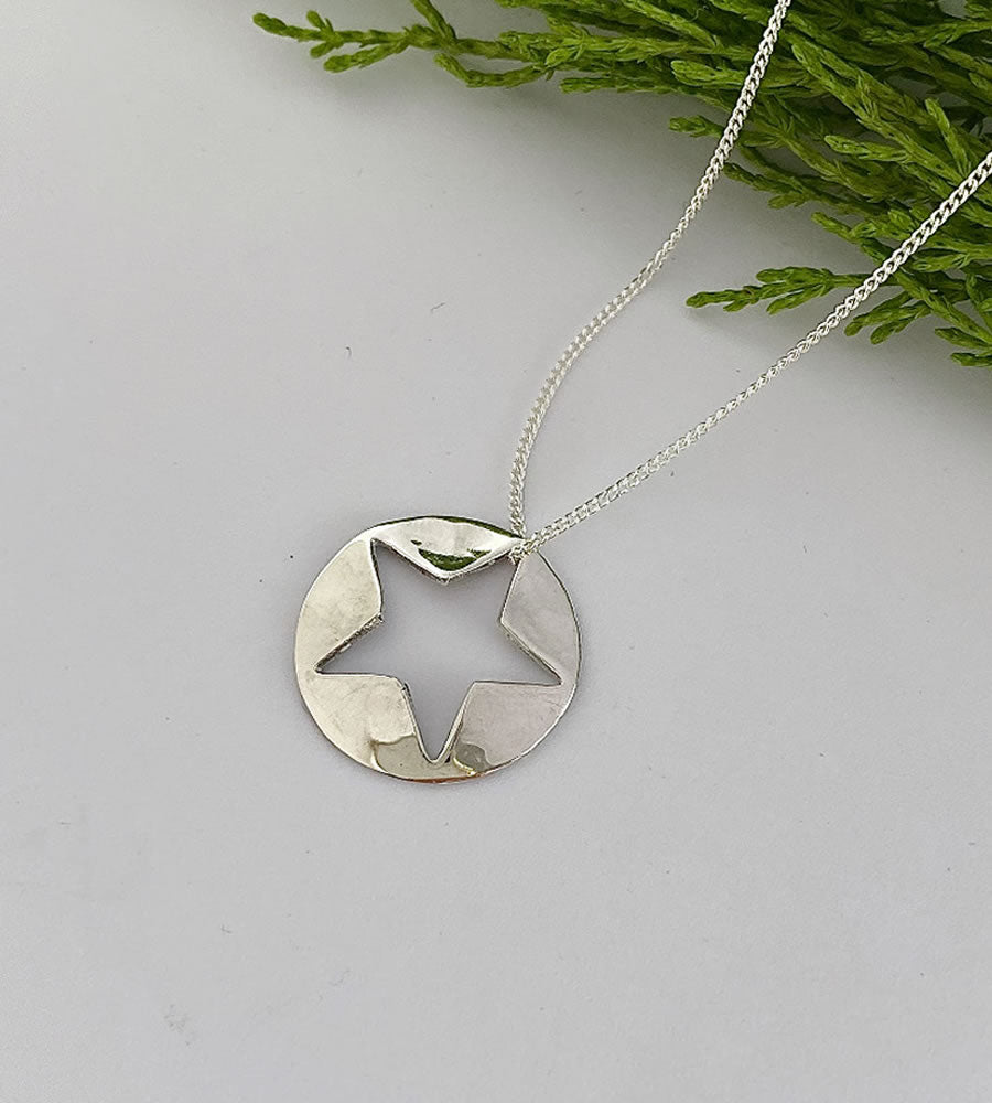 handcrafted sterling silver cut out star necklace
