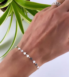 sterling silver multi hearts bracelet on model