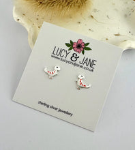 Load image into Gallery viewer, sterling silver T-Rex dinosaur earrings on a Lucy and jane backing card