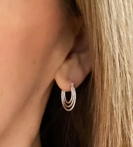 sterling silver triple hoop earrings on model