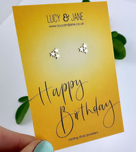 Load image into Gallery viewer, sterling silver triple star studs on a &#39;Happy Birthday&#39; backing card
