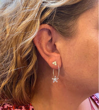 Load image into Gallery viewer, sterling silver triple star studs and the sterling silver flower hoops worn in a model&#39;s ear to create a great looking ear stack.