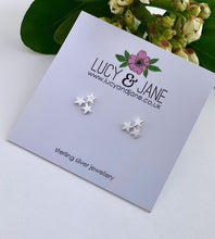 Load image into Gallery viewer, sterling silver triple star studs on a white card