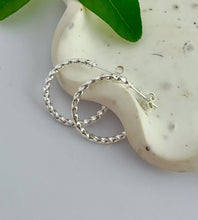 Load image into Gallery viewer, medium size sterling silver twist hoop with post and butterfly back