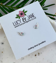 Load image into Gallery viewer, sterling silver wings ear studs with tiny pink and blue crystal on each wing.  Earrings displayed on a Lucy and Jane backing card